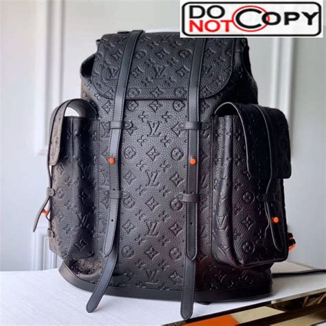 louis vuitton black embossed backpack.